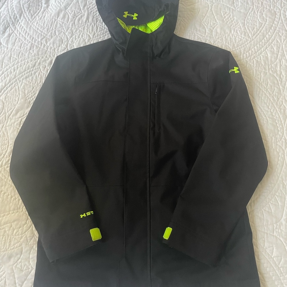 Boys M under amour jacket.  Barely worn black with lime green inside jacket